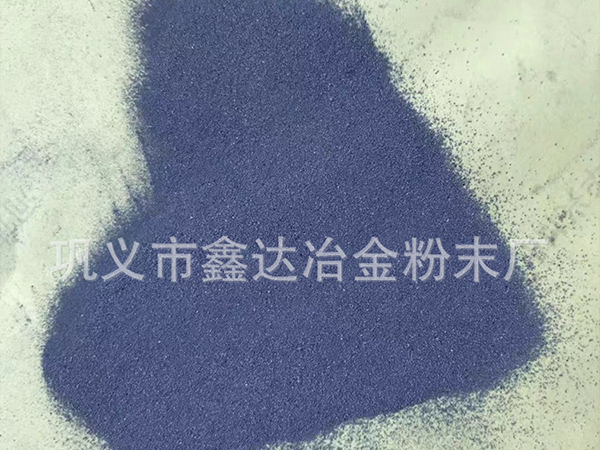 氧化铁皮在还原铁粉中充当什么角色？